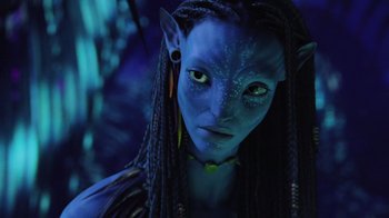 Movie still from “Avatar” (2009), directed by James Cameron – A person wearing a costume; Close Up shot, Overhead angle