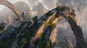 Movie still from “Avatar” (2009), directed by James Cameron – A view of a mountain with a plane flying over it; Extreme Wide shot, High angle