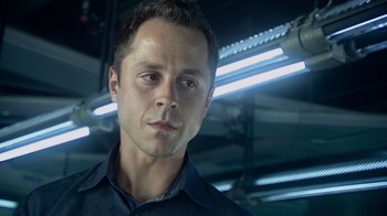 Movie still from “Avatar” (2009), directed by James Cameron – A person wearing a blue shirt; Close Up shot, Low angle