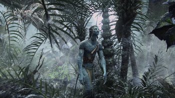 Movie still from “Avatar” (2009), directed by James Cameron – An animated character in the jungle with a sword; Wide shot, Low angle