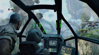 Movie still from “Avatar” (2009), directed by James Cameron – A view from inside a helicopter looking out over a jungle; Wide shot, High angle