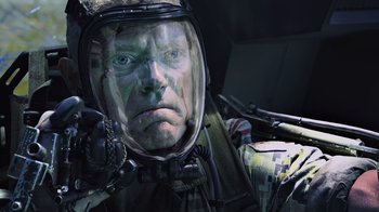 Movie still from “Avatar” (2009), directed by James Cameron – A person wearing a helmet; Close Up shot, Overhead angle