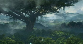 Movie still from “Avatar: The Way of Water” (2022), directed by James Cameron – An image of a tree in the middle of the jungle; Extreme Wide shot, Low angle
