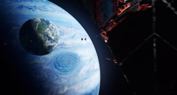 Movie still from “Avatar: The Way of Water” (2022), directed by James Cameron – An image of an image of a planet in the space; Extreme Wide shot, Overhead angle