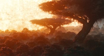 Movie still from “Avatar: The Way of Water” (2022), directed by James Cameron – The sun is setting behind a tree in the middle of the jungle; Extreme Wide shot, Low angle