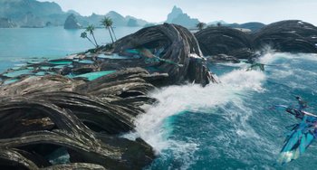 Movie still from “Avatar: The Way of Water” (2022), directed by James Cameron – An island with a body of water in the background; Extreme Wide shot, High angle