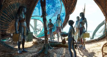 Movie still from “Avatar: The Way of Water” (2022), directed by James Cameron – A group of people standing in a room with plants; Wide shot, Low angle