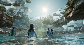 Movie still from “Avatar: The Way of Water” (2022), directed by James Cameron – A group of people swimming in a body of water; Extreme Wide shot, High angle