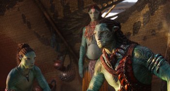 Movie still from “Avatar: The Way of Water” (2022), directed by James Cameron – A couple of people standing next to each other; Medium shot, High angle