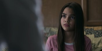 Movie still from “Awake” (2021), directed by Mark Raso – A young girl is sitting in front of a mirror; Close Up shot, Over the shoulder angle
