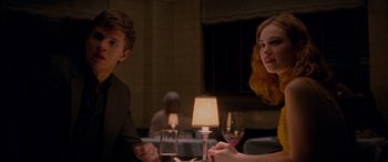 Movie still from “Baby Driver” (2017), directed by Edgar Wright – A man and a woman sitting at a dinner table; Medium shot, Over the shoulder angle