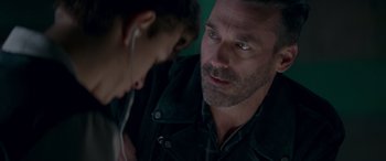 Movie still from “Baby Driver” (2017), directed by Edgar Wright – A person and a person looking at something; Close Up shot, Over the shoulder angle