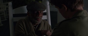 Movie still from “Baby Driver” (2017), directed by Edgar Wright – An older man sitting in a chair talking to a younger man; Close Up shot, Over the shoulder angle