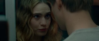 Movie still from “Baby Driver” (2017), directed by Edgar Wright – A person looking at another person; Close Up shot, Over the shoulder angle