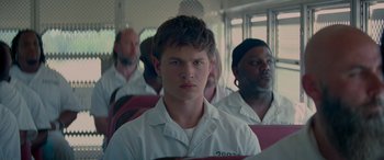 Movie still from “Baby Driver” (2017), directed by Edgar Wright – A group of people sitting in a bus; Close Up shot, Over the shoulder angle