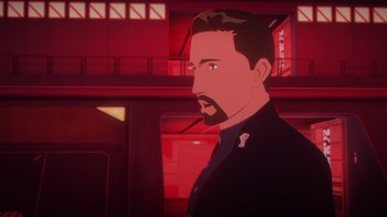 Movie still from “Babylon 5: The Road Home” (2023), directed by Matt Peters – A man with a beard is standing in front of a building; Close Up shot, Over the shoulder angle