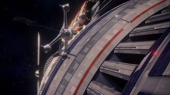Movie still from “Babylon 5: The Road Home” (2023), directed by Matt Peters – An image of a space ship that is in the air; Extreme Wide shot, Overhead angle