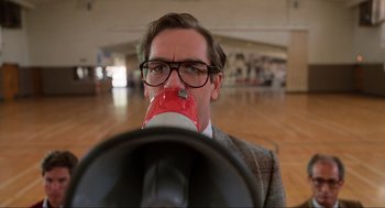 Movie still from “Back to the Future” (1985), directed by Robert Zemeckis – A man with a megaphone in his mouth; Close Up shot, Low angle