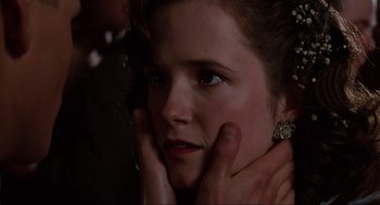 Movie still from “Back to the Future” (1985), directed by Robert Zemeckis – A person with their hands on her face; Close Up shot, Over the shoulder angle