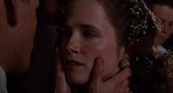 Movie still from “Back to the Future” (1985), directed by Robert Zemeckis – A person with her hands on her face; Close Up shot, Over the shoulder angle