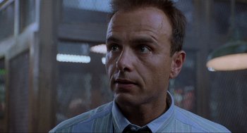 Movie still from “Bad Boys” (1995), directed by Michael Bay – A person wearing a shirt and a tie; Close Up shot, Low angle