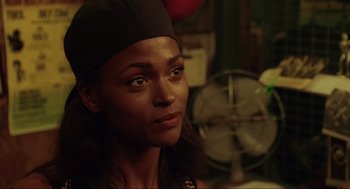 Movie still from “Bad Boys” (1995), directed by Michael Bay – A person wearing a hat; Close Up shot, Over the shoulder angle
