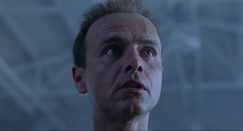 Movie still from “Bad Boys” (1995), directed by Michael Bay – A person looking up at the sky; Close Up shot, Low angle