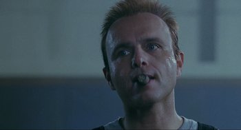 Movie still from “Bad Boys” (1995), directed by Michael Bay – A person with a cigarette in his mouth; Close Up shot, Low angle