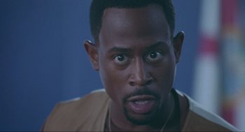 Movie still from “Bad Boys” (1995), directed by Michael Bay – A man's eyes and face; Close Up shot, Low angle