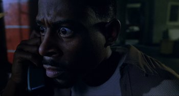 Movie still from “Bad Boys” (1995), directed by Michael Bay – A person with his eyes wide open; Close Up shot, Low angle