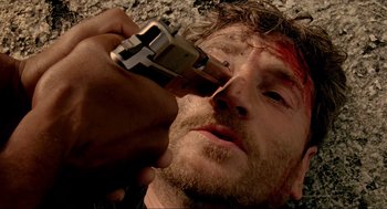 Movie still from “Bad Boys” (1995), directed by Michael Bay – A person holding a gun; Extreme Close Up shot, High angle