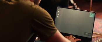 Movie still from “Bad Boys for Life” (2020), directed by Adil El Arbi – A man sitting in front of an open laptop computer; Extreme Close Up shot, Over the shoulder angle