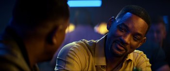 Movie still from “Bad Boys for Life” (2020), directed by Adil El Arbi – A man sitting in front of another man in a room; Close Up shot, Over the shoulder angle