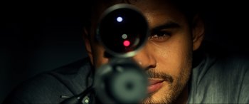 Movie still from “Bad Boys for Life” (2020), directed by Adil El Arbi – A person looking through a scope; Extreme Close Up shot, Overhead angle