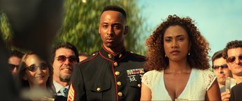 Movie still from “Bad Boys for Life” (2020), directed by Adil El Arbi – A man in a military uniform standing next to a woman; Close Up shot, Low angle