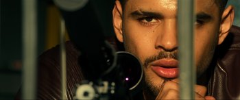 Movie still from “Bad Boys for Life” (2020), directed by Adil El Arbi – A man's face and a camera; Extreme Close Up shot, Overhead angle