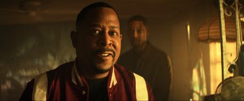 Movie still from “Bad Boys for Life” (2020), directed by Adil El Arbi – A man in a red and white jacket and a man in a brown jacket; Close Up shot, Low angle
