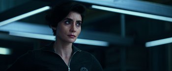 Movie still from “Bad Boys for Life” (2020), directed by Adil El Arbi – A woman with short black hair is looking to her left; Close Up shot, Over the shoulder angle