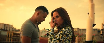 Movie still from “Bad Boys for Life” (2020), directed by Adil El Arbi – A man and a woman standing next to each other; Medium shot, Over the shoulder angle