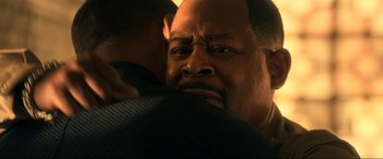 Movie still from “Bad Boys for Life” (2020), directed by Adil El Arbi – A person holding another person's shoulder; Close Up shot, Over the shoulder angle