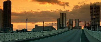 Movie still from “Bad Boys for Life” (2020), directed by Adil El Arbi – A view of a city skyline at sunset; Extreme Wide shot, Low angle