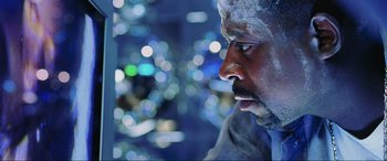 Movie still from “Bad Boys II” (2003), directed by Michael Bay – A person looking at something; Close Up shot, Low angle