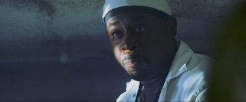 Movie still from “Bad Boys II” (2003), directed by Michael Bay – A person wearing a hat; Close Up shot, Low angle