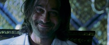 Movie still from “Bad Boys II” (2003), directed by Michael Bay – A person with long hair; Close Up shot, Low angle