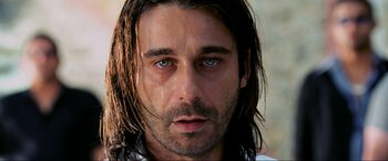Movie still from “Bad Boys II” (2003), directed by Michael Bay – A person with long hair; Close Up shot, Low angle