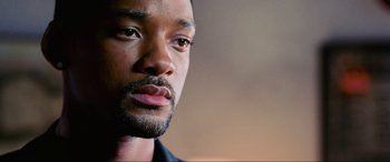 Movie still from “Bad Boys II” (2003), directed by Michael Bay – A man with a beard looking into the distance; Close Up shot, Over the shoulder angle