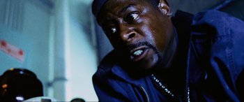 Movie still from “Bad Boys II” (2003), directed by Michael Bay – A person with a crying face; Close Up shot, Low angle