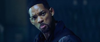 Movie still from “Bad Boys II” (2003), directed by Michael Bay – A man with a beard is looking at the camera; Close Up shot, Low angle