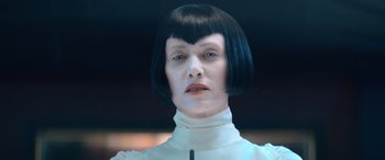 Movie still from “Barb and Star Go to Vista Del Mar” (2021), directed by Josh Greenbaum – A man with a black hair and a white shirt; Close Up shot, Low angle