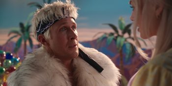 Movie still from “Barbie” (2023), directed by Greta Gerwig – A person wearing a fur coat; Close Up shot, Over the shoulder angle